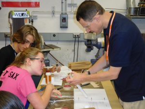 Students building model boost gliders and rockets